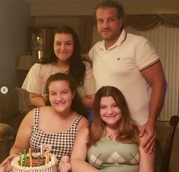 Nicolina Bozzo with her sisters and father