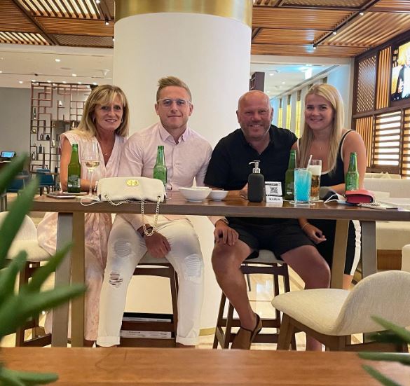 Paul with his parents and sibling