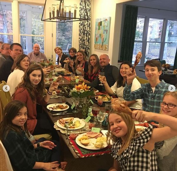 Penn Holderness with his family members