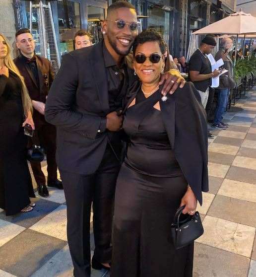 Quincy Isaiah with his mother