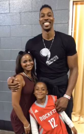 Royce with Dwight Howard and Braylon Howard