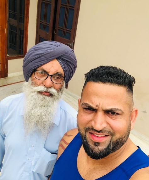 Sandeep Nangal Ambia with his father