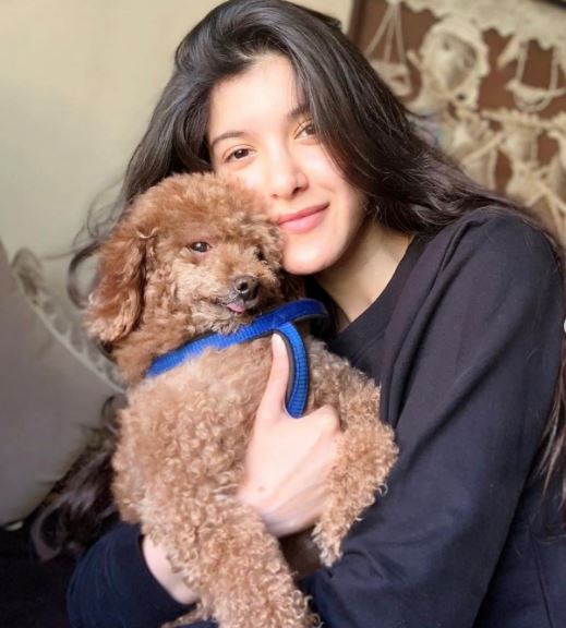 Shanaya with her pet dog