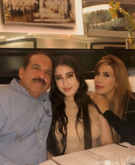 Sophia Markamati with her brother and niece