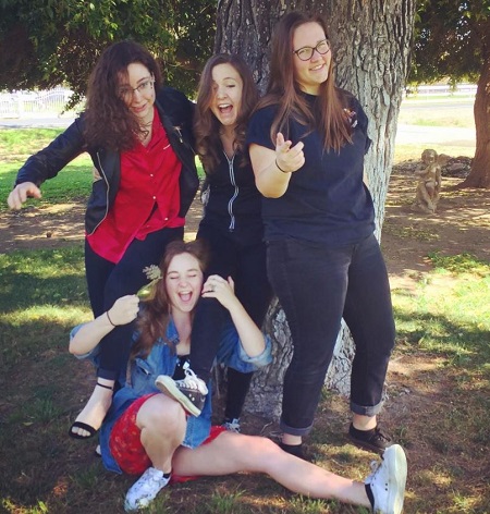 Taylor Tomlinson with her siblings
