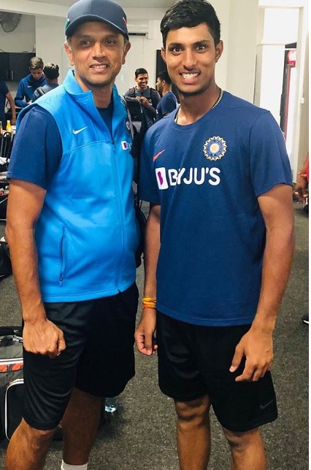 Tilak Varma with Rahul Dravid