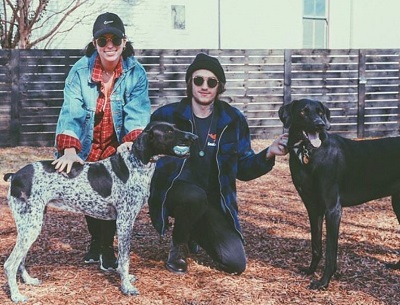 Braison Cyrus with his pet dogs