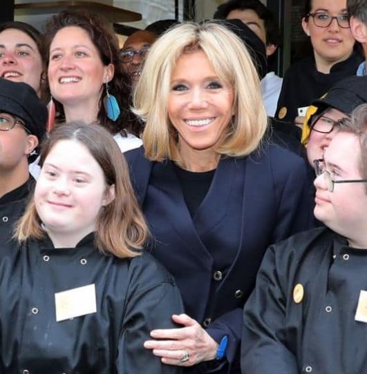 Brigitte Macron likes to help kids