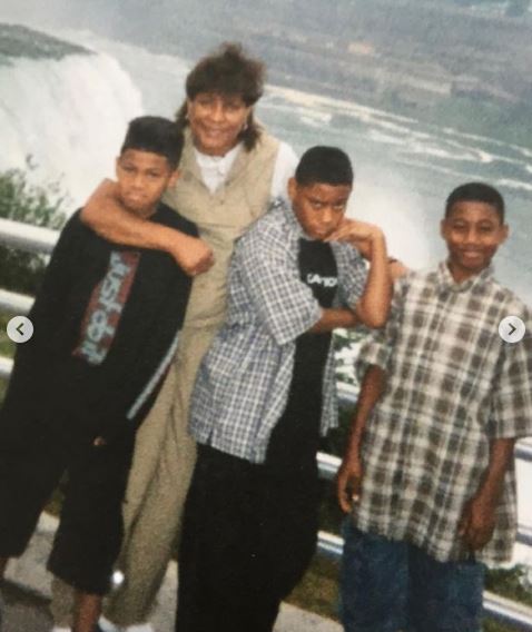 Childhood photo of Shane with his siblings and grandmom