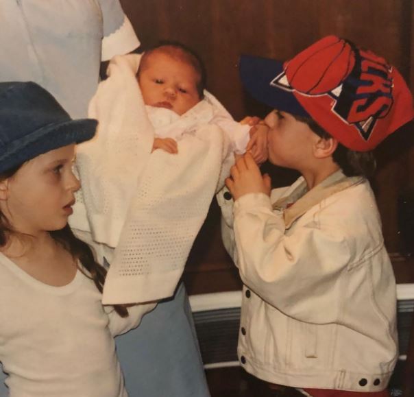 Childhood photo of Brad with his siblings
