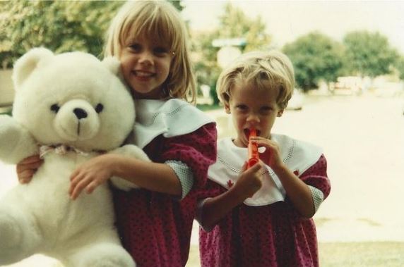 Childhood photo of Whitney with her sister Amber Heard