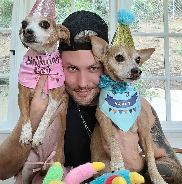 Dennis with his pet dogs