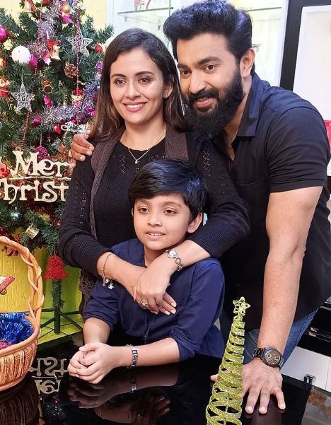 Dhanya Mary Varghese with her spouse and child