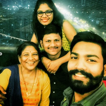 Dhawal with his mother, sister and brother