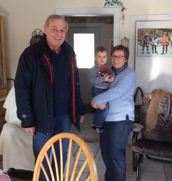 Lise Lafleur with her husband and grandson