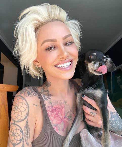 Louise with her pet dog