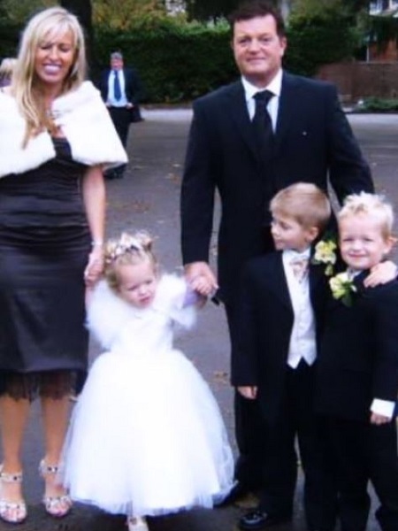 Mia Woodhall with her dad and mother