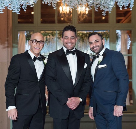 Mike Shouhed with his two brothers