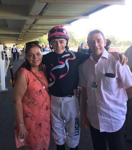 Robbie Dolan with his father and mother