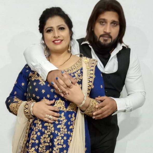 Victor John with his wife