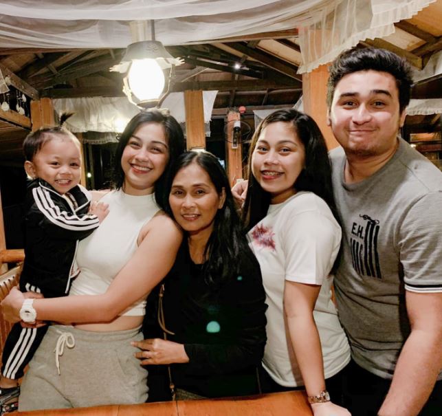 Zeinab with her family