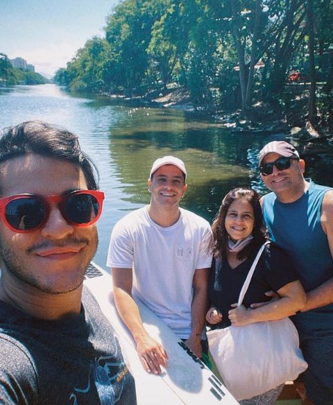 Andre with his mom, dad, and brother