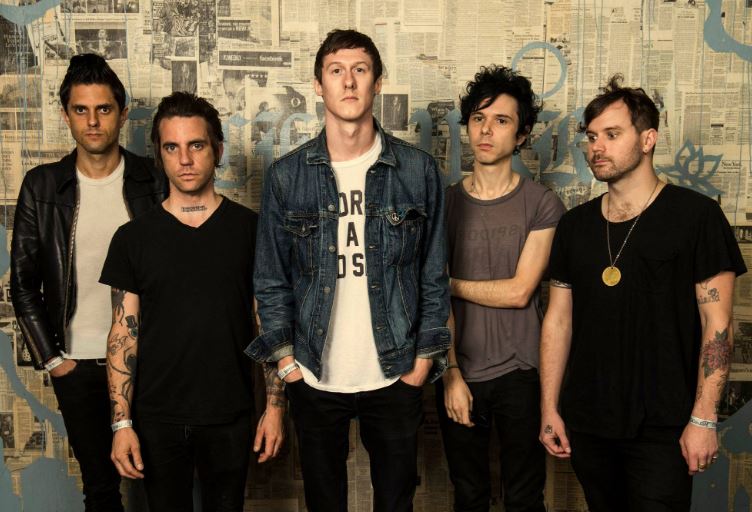 Gabe with the members of Head Wound City band