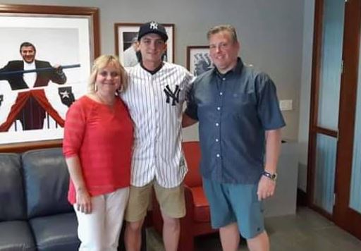 Jacob with his parents Tim Sanford and Karina Sanford