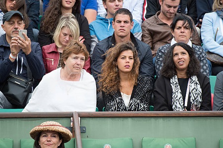 Noura El Shwekh sitting with her husband sister and mother