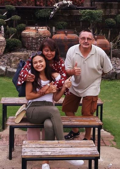 Pauline with her parents