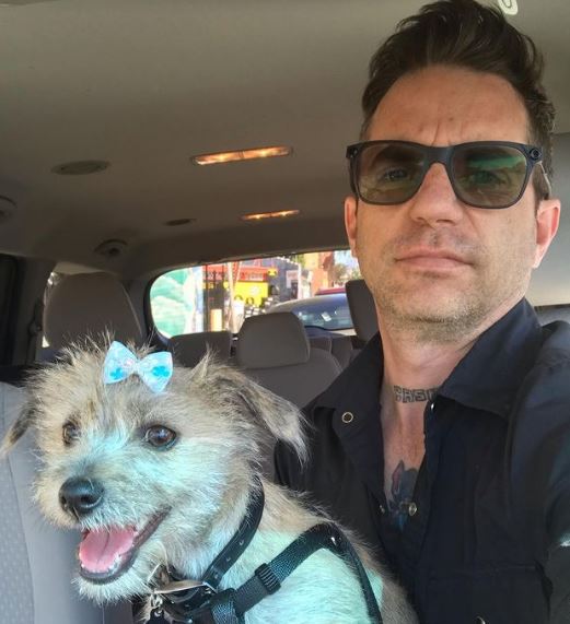 Serbian and his pet dog
