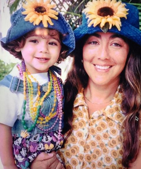 Young Cristina with her mom