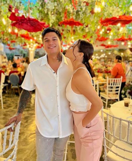 Zeus Collins with his girlfriend