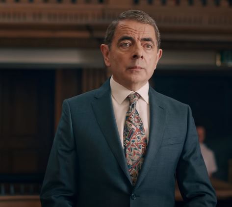 Actor Rowan Atkinson as Trevor Bingley