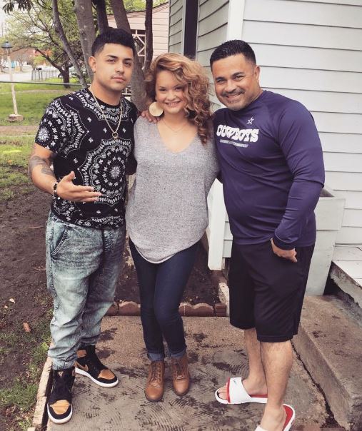 Andrea with her uncle and brother