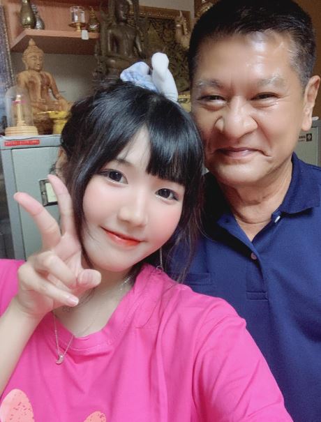 Arisara with her father