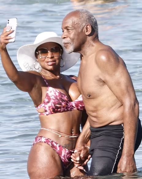 Danny Glover spotted with Regina Murray