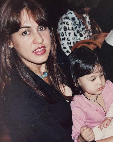 Emily Tosta childhood image with her mother