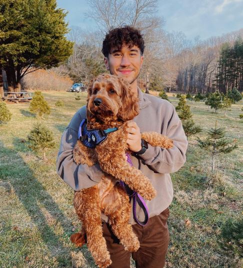 Evan with his pet dog