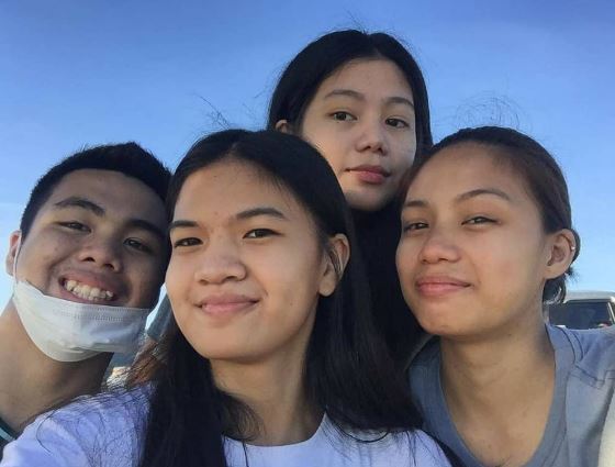 Ivy Lacsina with her siblings