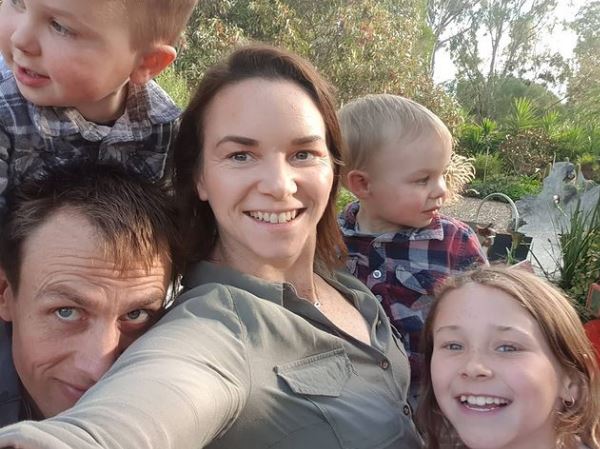 Kristy with her husband and kids