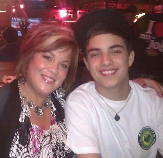 Lane Fernandez and his mother