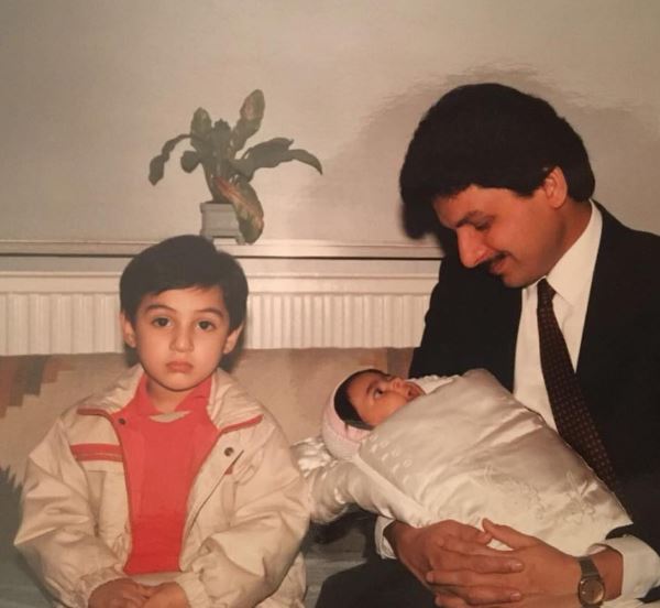 Leo with his dad and brother