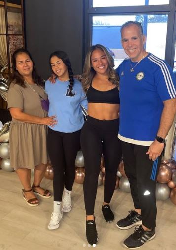 Loureda with her family