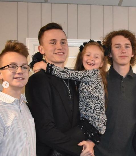 Mitch with his siblings