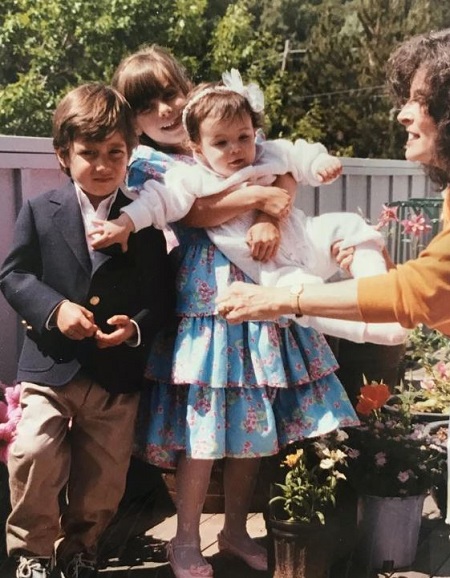 Monica Barbaro childhood picture with her elder siblings