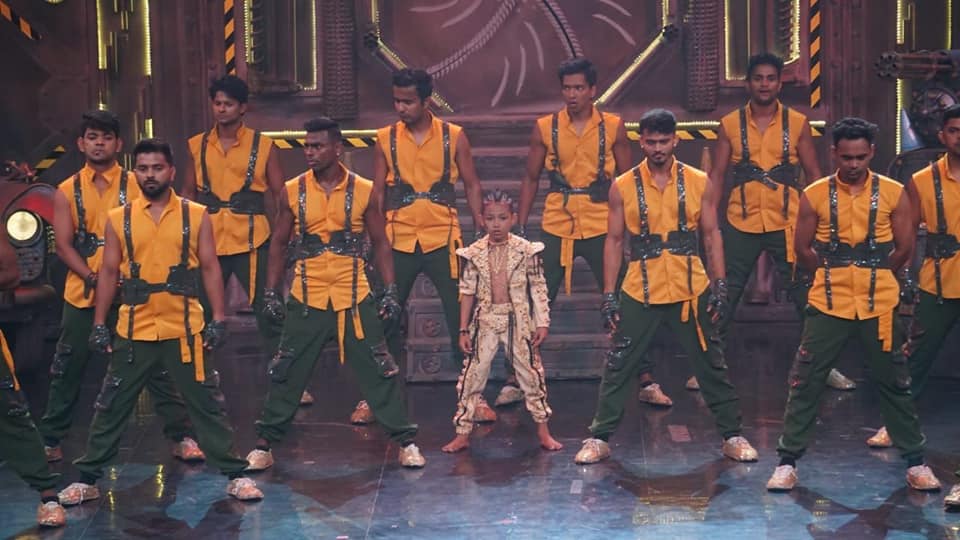 Nobojit Narzary performing on the stage of Dance India Dance