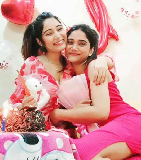 Priya Mishra with her sister