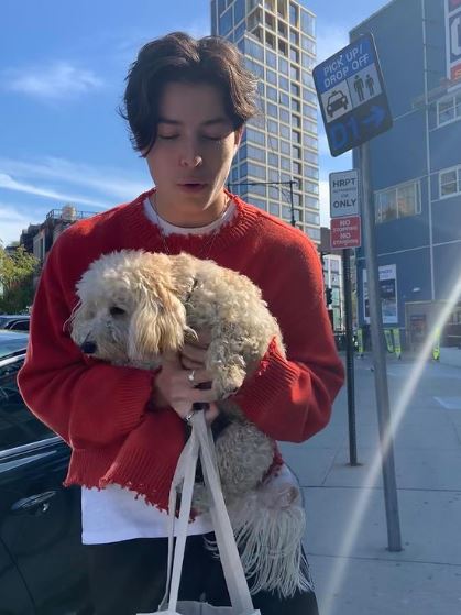 Spencer Barnett with his pet dog
