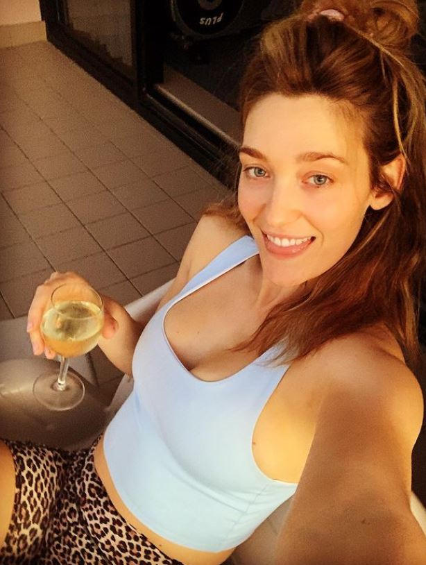 Tess Haubrich consumes alcohol